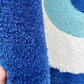 blue evil eye round shaped tufted accent rug