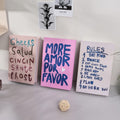 Decorative faux book storage box designed as a colorful hardcover book with a hidden storage compartment for organizing small household items while decorating shelves and tables
