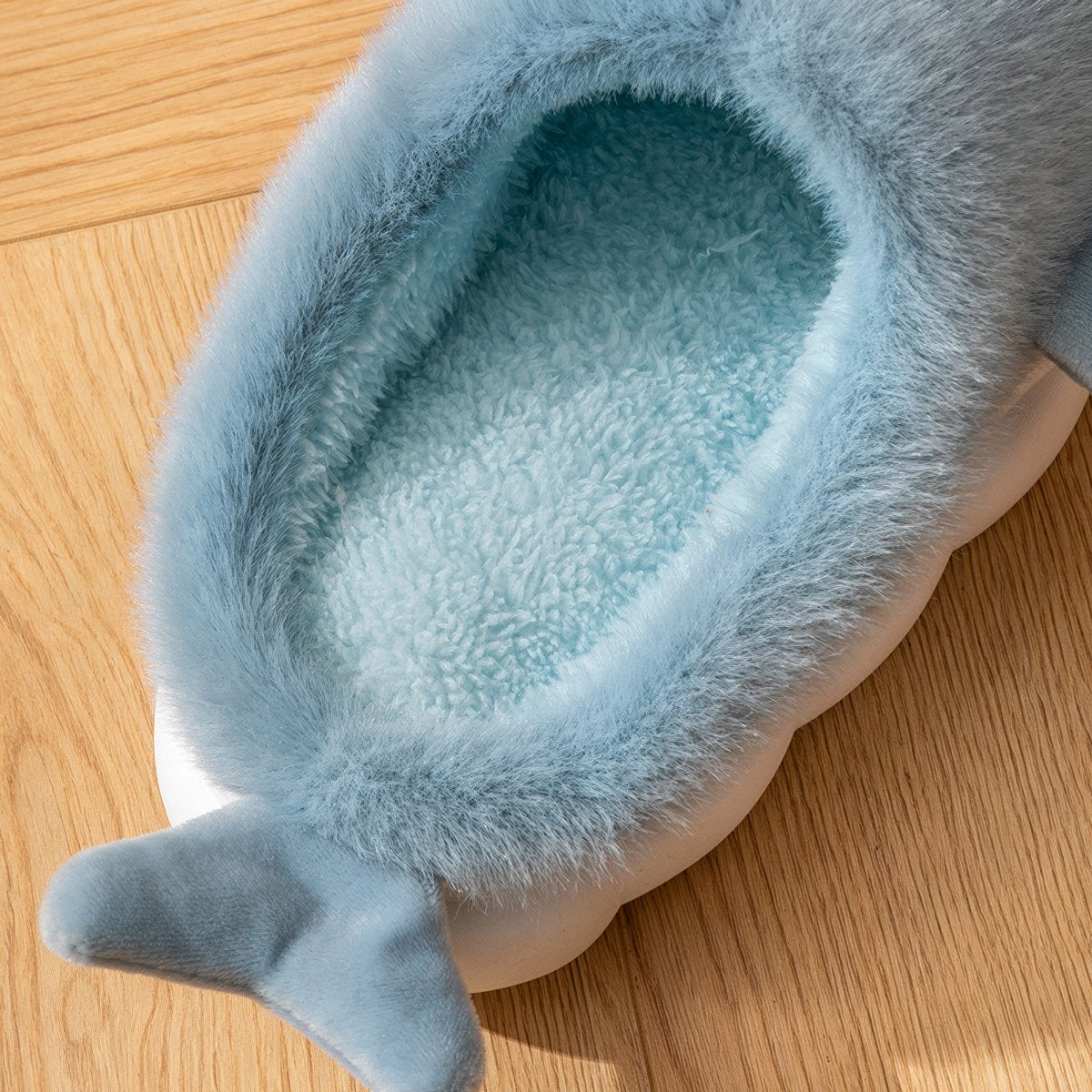 blue plush shark slippers with cartoon design and soft cushioned sole shark slides