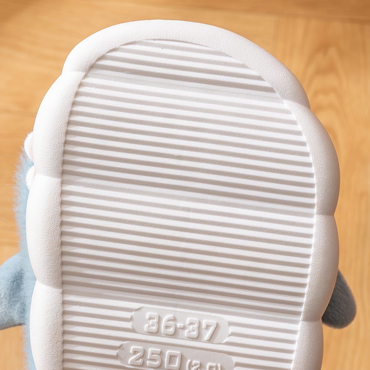blue plush shark slippers with cartoon design and soft cushioned sole shark slides