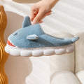 blue plush shark slippers with cartoon design and soft cushioned sole shark slides