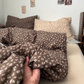 brown floral bedding set with small ivory flowers and soft textured fabric duvet cover