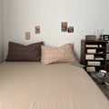 brown floral bedding set with small ivory flowers and soft textured fabric duvet cover