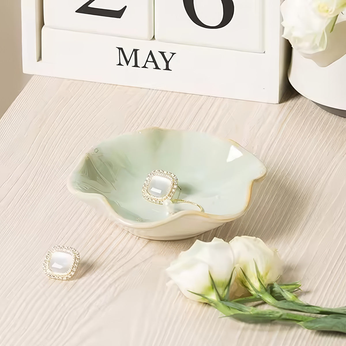 Green ceramic flower shaped jewelry tray