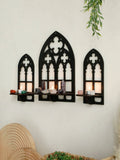 set of three gothic-style black wooden wall display shelf candle holders