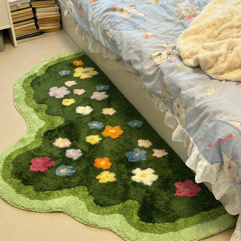 green lawn irregular shaped blooming colorful flowers tufted bedside accent rug