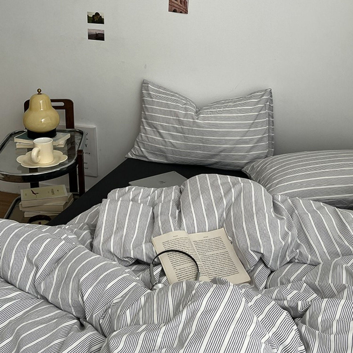 Minimalist grey and white striped duvet cover set with matching pillows and dark flat or fitted sheet set