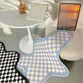 irregular blob shaped checkered pattern print accent rug