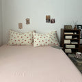 soft girl aesthetic bedding set with cream base and juicy red cherries pattern print