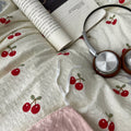 soft girl aesthetic bedding set with cream base and juicy red cherries pattern print