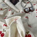 soft girl aesthetic bedding set with cream base and juicy red cherries pattern print