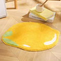 yellow lemon-shaped accent throw rug 