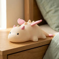 Cute white dragon silicone night light with pink or blue details and soft glowing body