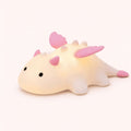 Cute white dragon silicone night light with pink or blue details and soft glowing body