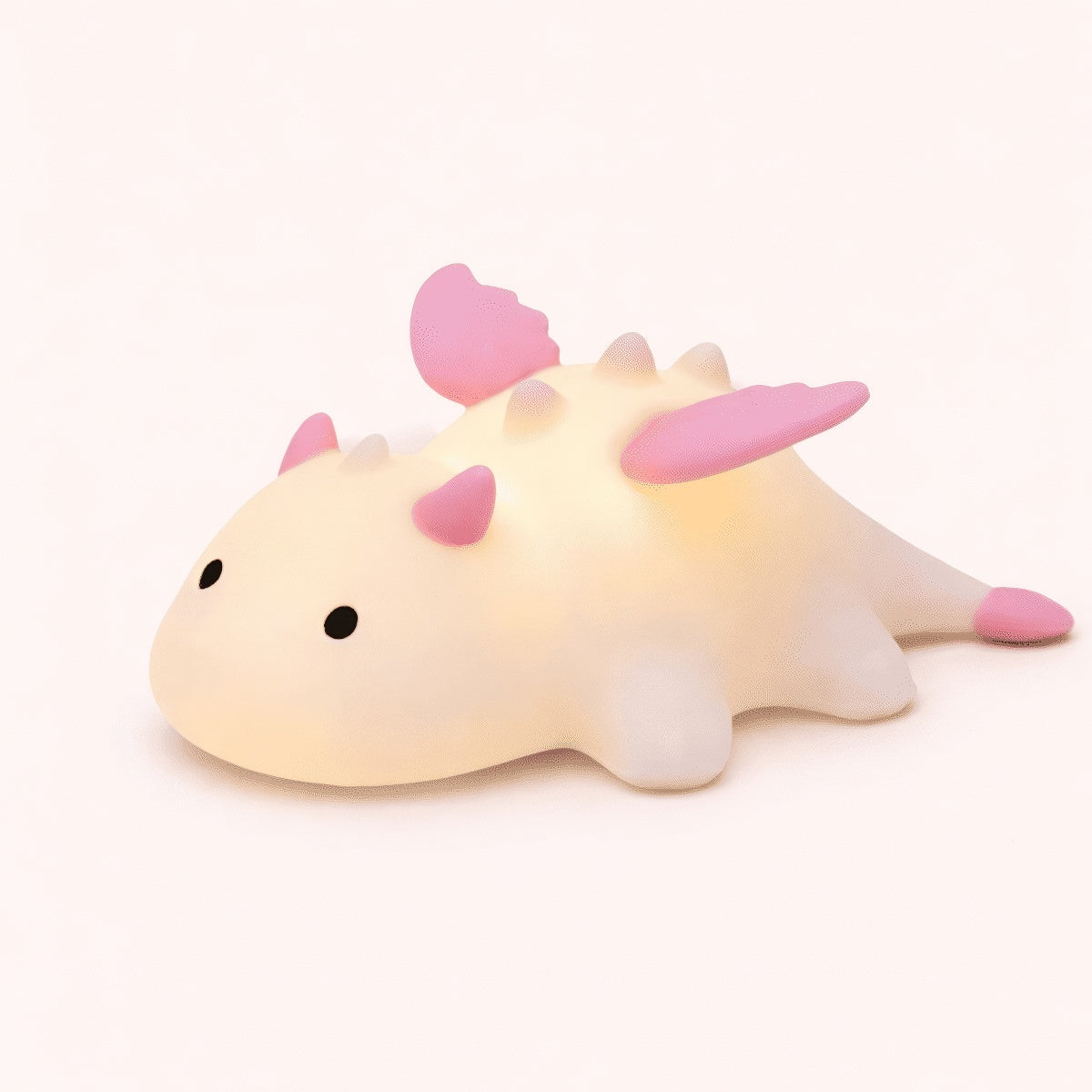 Cute white dragon silicone night light with pink or blue details and soft glowing body