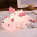 Cute white dragon silicone night light with pink or blue details and soft glowing body