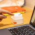 Rechargeable keyboard key-shaped LED night light with a soft warm glow, oversized mechanical keycap design, and tactile press switch for desks and bedside tables.