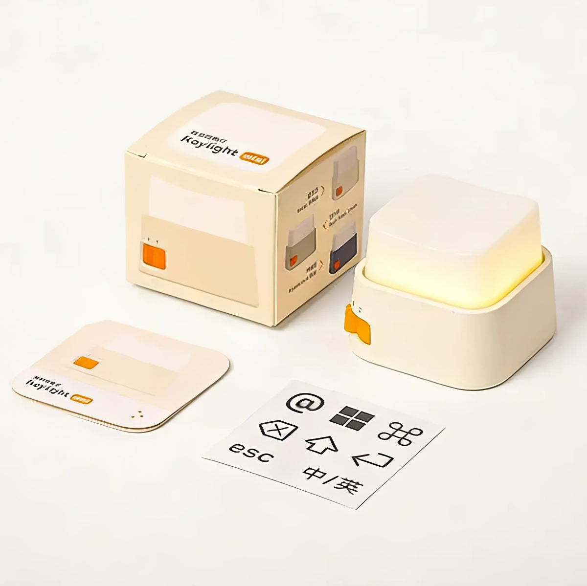 Rechargeable keyboard key-shaped LED night light with a soft warm glow, oversized mechanical keycap design, and tactile press switch for desks and bedside tables.