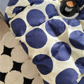 aesthetic bedding duvet cover set with large blue polka dot pattern print on beige/white background