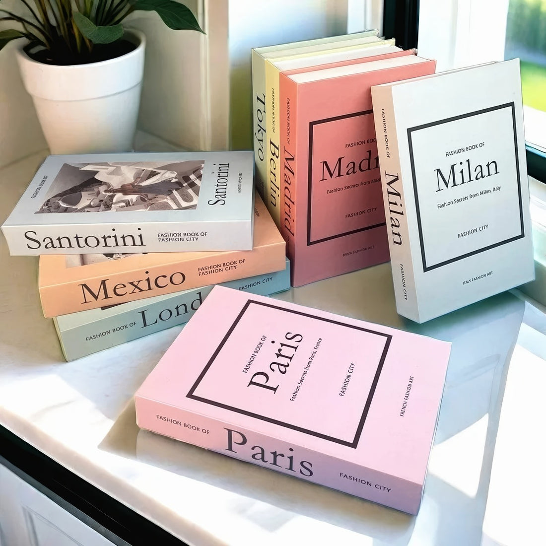 Fake book storage titled 'Fashion Book of Paris' with Eiffel Tower image on a white background