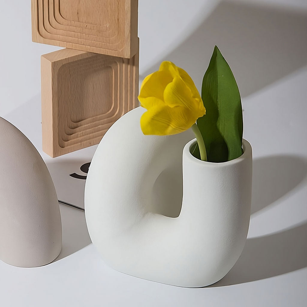 minimalist curved tube ceramic vase