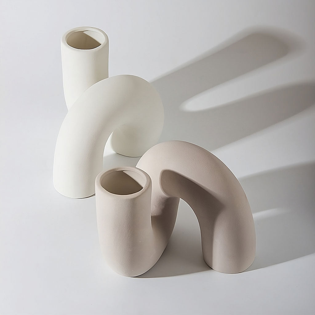 minimalist curved tube ceramic vase