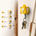 Two yellow block-style key hooks designed like Super Mario question blocks. Yellow Mystery Box hidden hook key holder with white question mark design