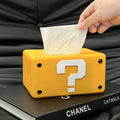 yellow retro question block tissue box cover with white question mark design and compact rectangular shape