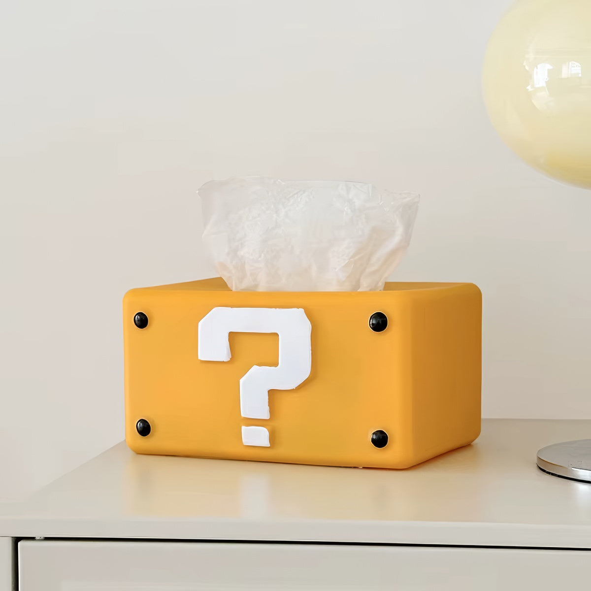 yellow retro question block tissue box cover with white question mark design and compact rectangular shape