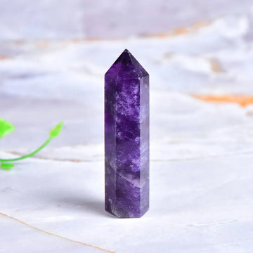 Natural deep purple amethyst crystal hexagonal pointing tower