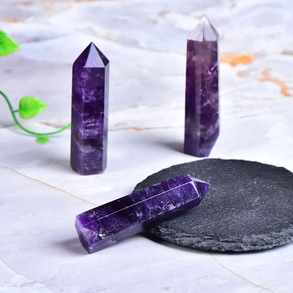 Natural deep purple amethyst crystal hexagonal pointing tower