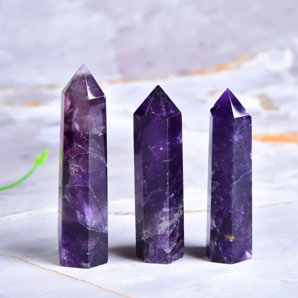 Natural deep purple amethyst crystal hexagonal pointing tower