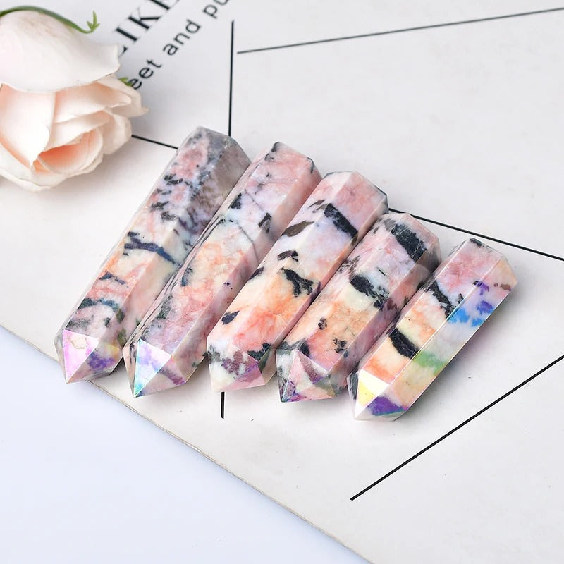 Natural light pink aura crystal with black inclusions hexagonal pointing tower