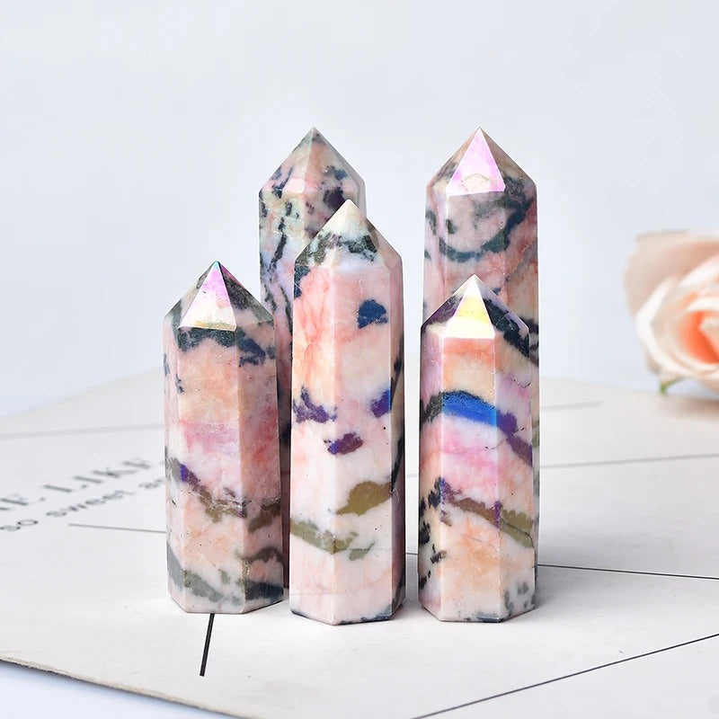 Natural light pink aura crystal with black inclusions hexagonal pointing tower
