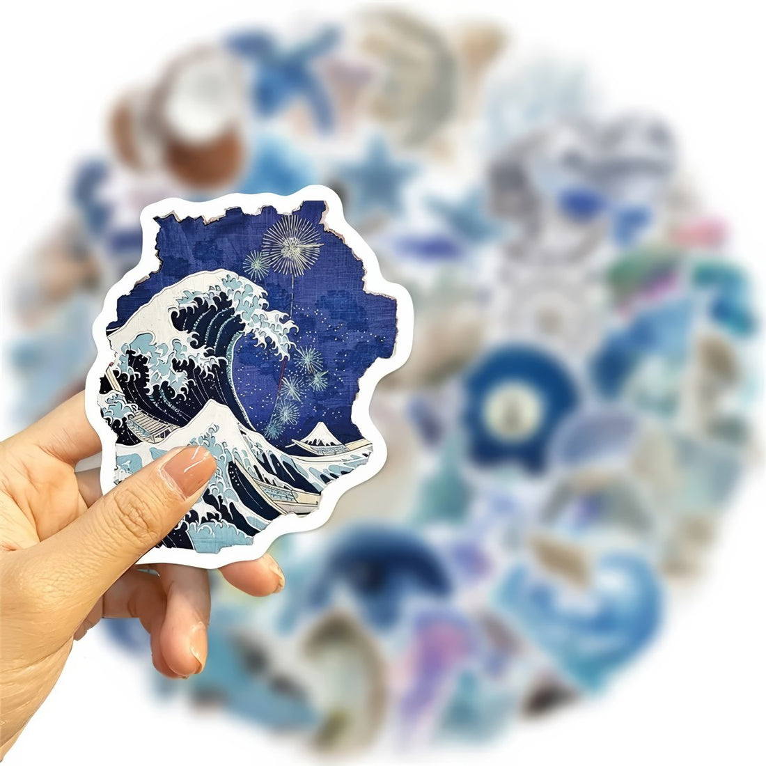 Collection of various sea-themed stickers including shells, corals, and marine creatures.