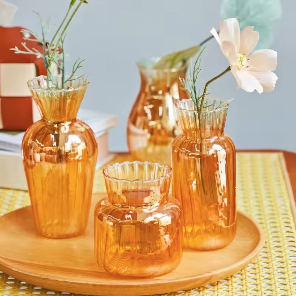 glossy orange color with ribbed texture vintage aesthetic glass vase