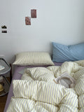 pale pastel aesthetic striped yellow, lilac, and light blue bedding duvet cover set 