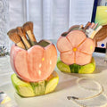 Pink ceramic tulip flower pen holder with green leaf-shaped