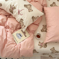 Teddy bear patterned bedding with dusty peachy pillow cases and duvet cover