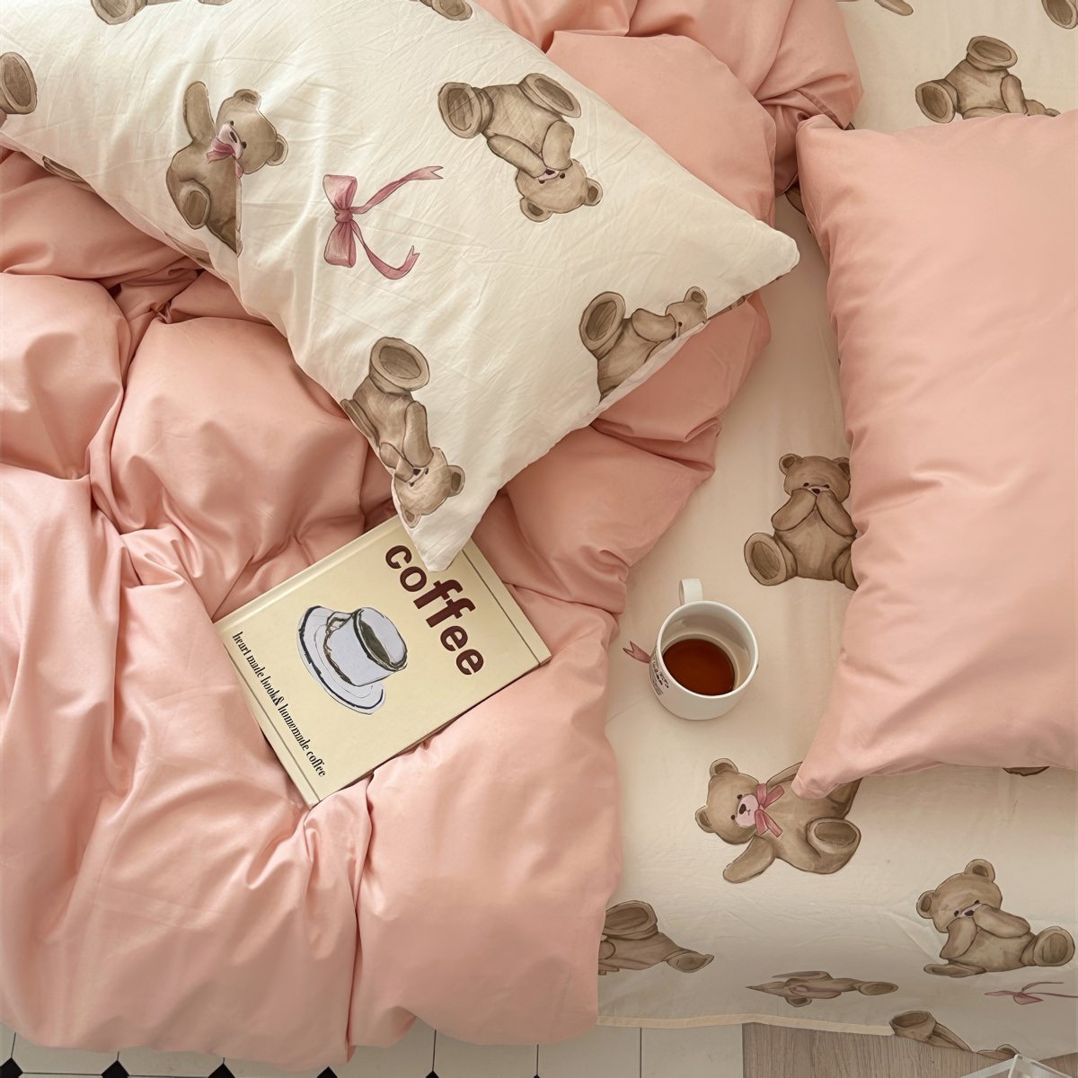 Teddy bear patterned bedding with dusty peachy pillow cases and duvet cover