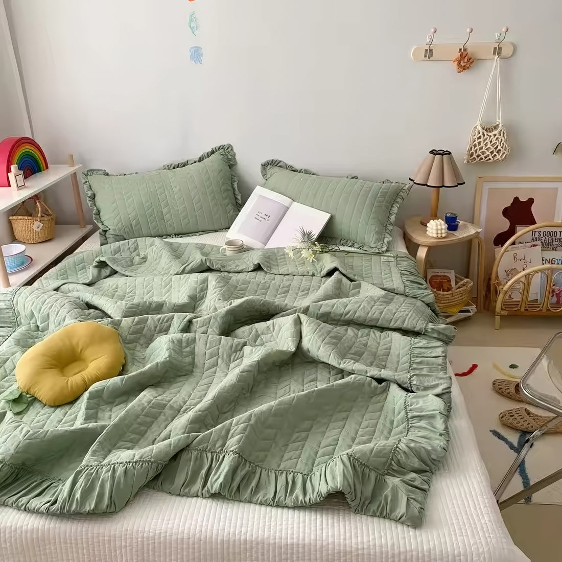 Ruffled summer quilt set with chevron stitching and ruffle trim, available in pastel and neutral colors