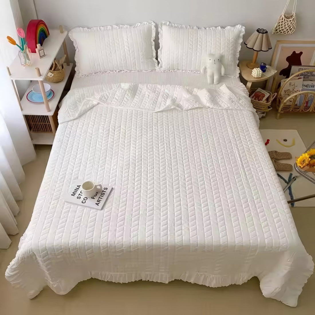 Ruffled summer quilt set with chevron stitching and ruffle trim, available in pastel and neutral colors