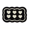 six hearts black white tufted rug