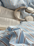 Light blue striped cotton duvet cover set with matching pillowcases