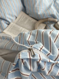 Light blue striped cotton duvet cover set with matching pillowcases