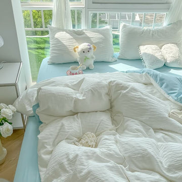 soft cloud ribbed washed cotton effect bedding set in light blue and white colors