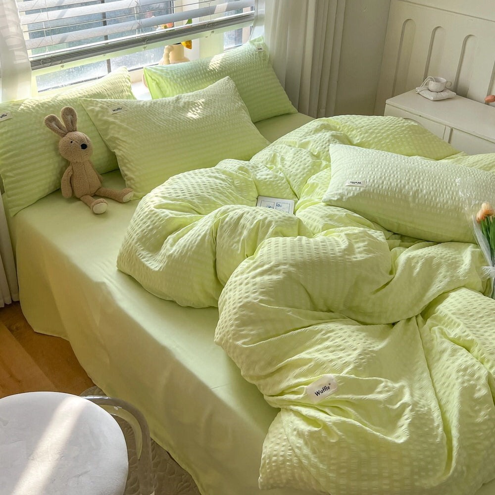 green color bedding set with waffled duvet cover and shams and matching flat sheet roomtery