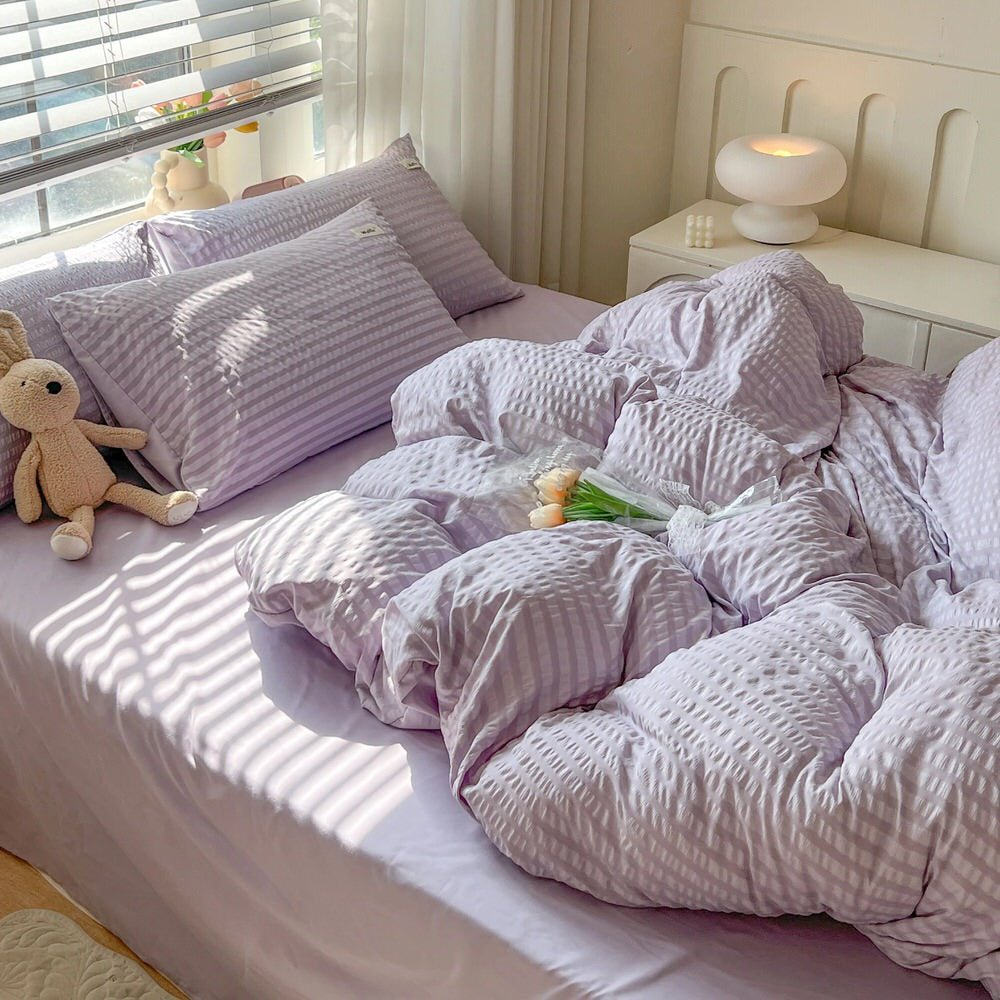purple color bedding set with waffled duvet cover and shams and matching flat sheet roomtery