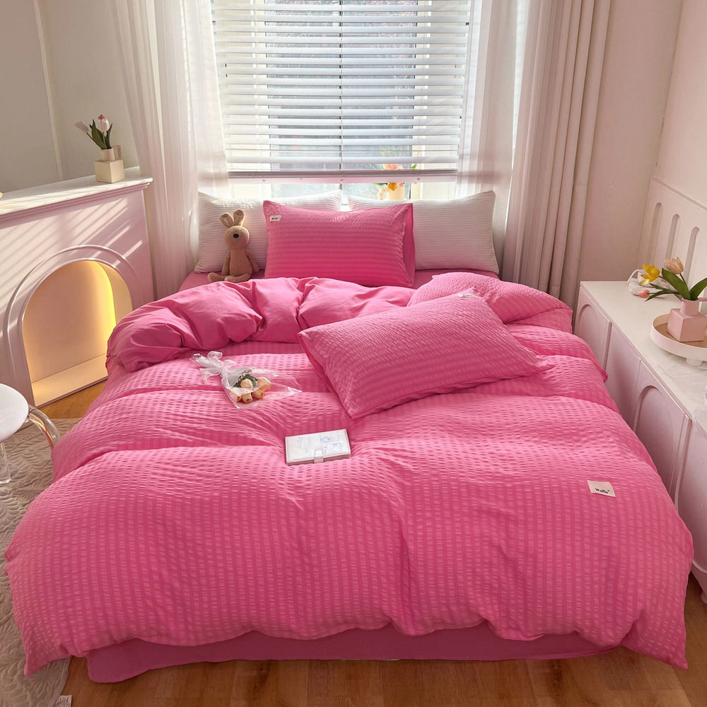 bright pink color bedding set with waffled duvet cover and shams and matching flat sheet roomtery