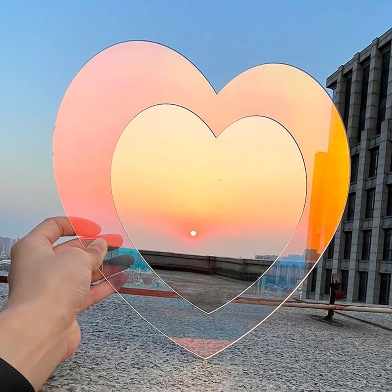 aesthetic heart shaped mirror made of iridescent specular acrylic 